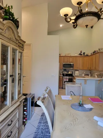 Looking from the Dining room towards the kitchen and breakfast bar area.