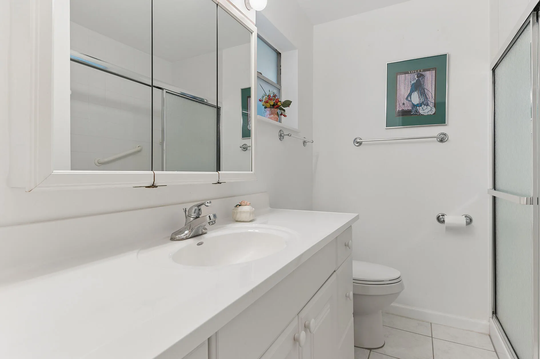 Master bath nicely updated with linen closet.