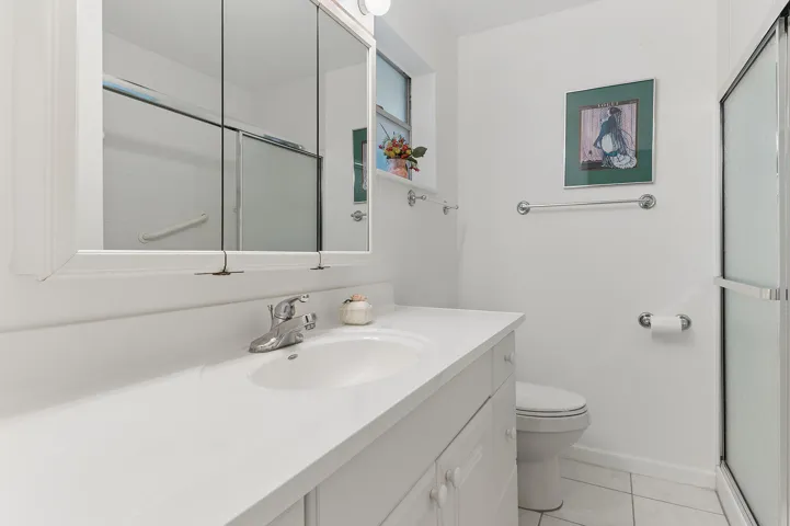 Master bath nicely updated with linen closet.