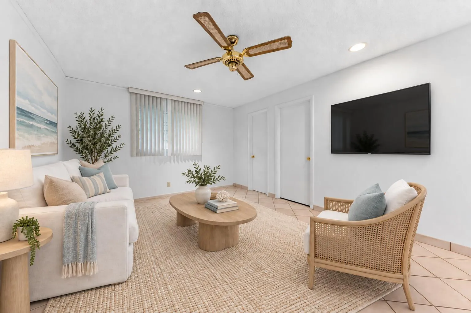 All tiled family room with sliding glass doors out to enclosed porch. Virtually Staged.