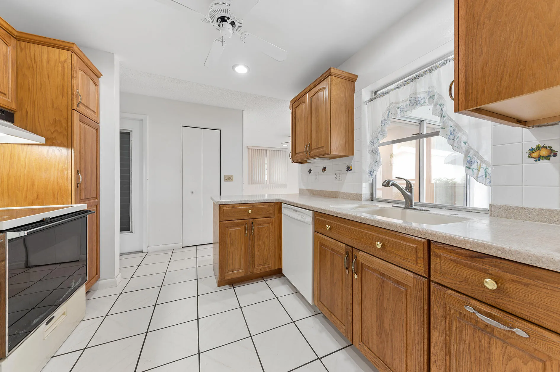 Kitchen cabinetry replaced. Recessed lighting.