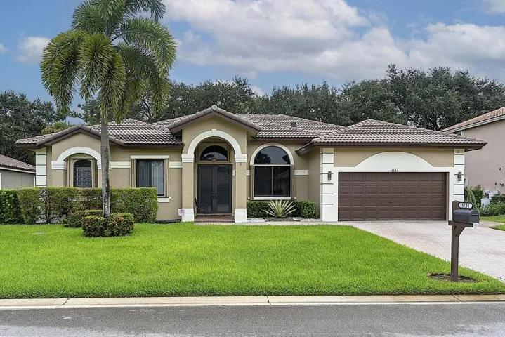 Beautiful 4/3 with additional flex room, 2 car garage and pool!