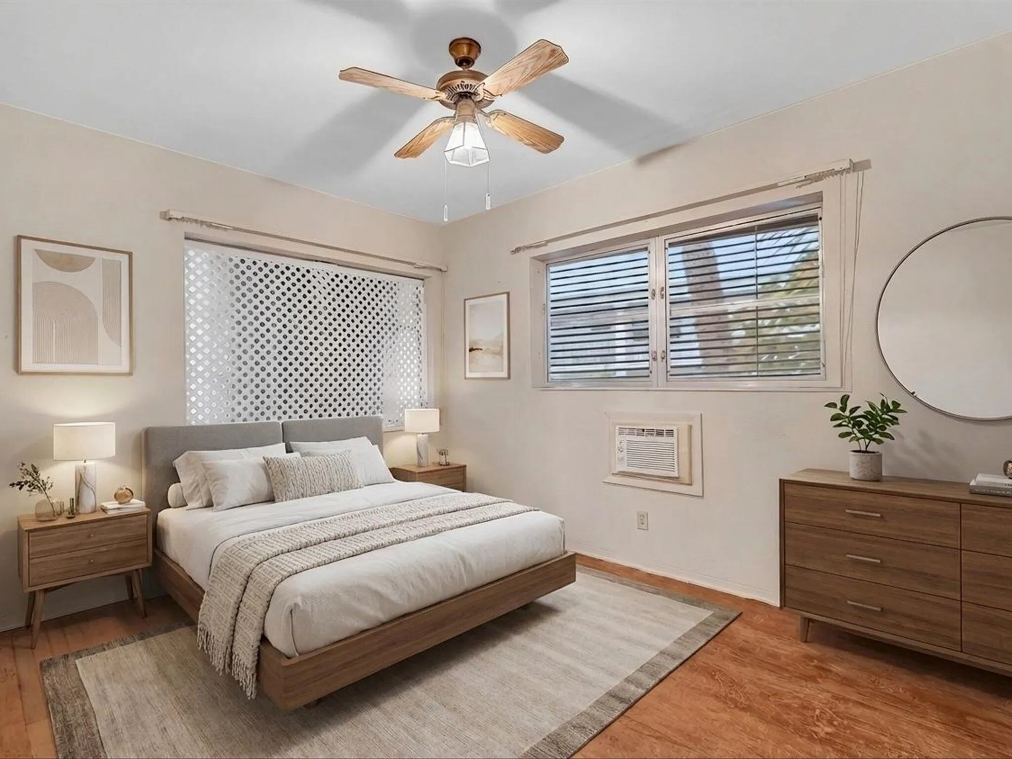 Wood-finish flooring with a ceiling fan light fixture