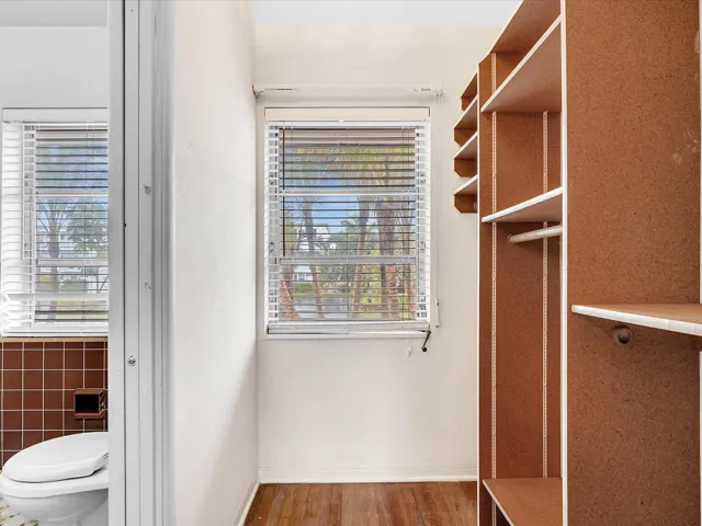 Custom closet storage system with integrated shelving and hanging rods