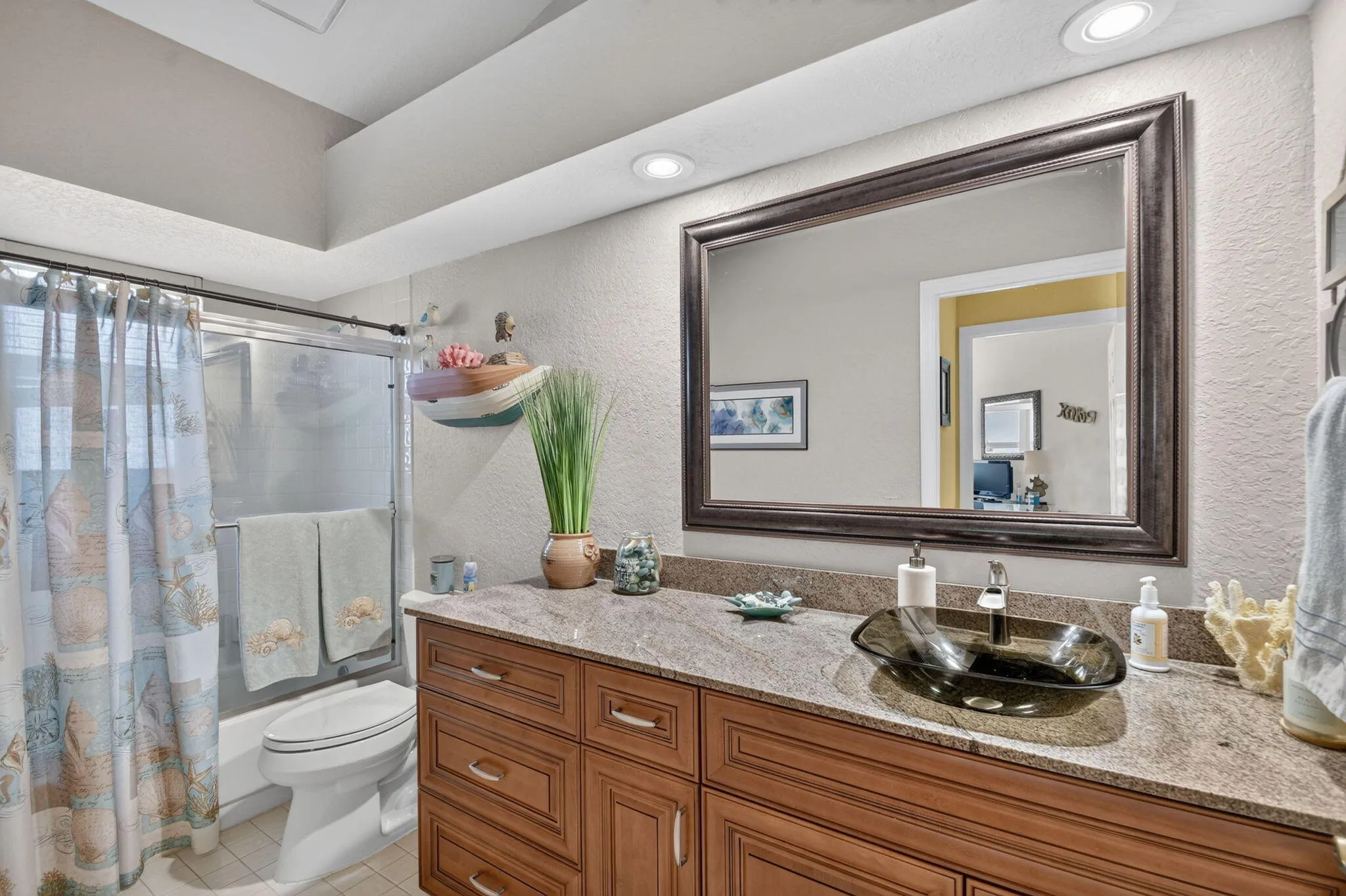 Gorgeous wood panel cabinetry-Granite countertops.