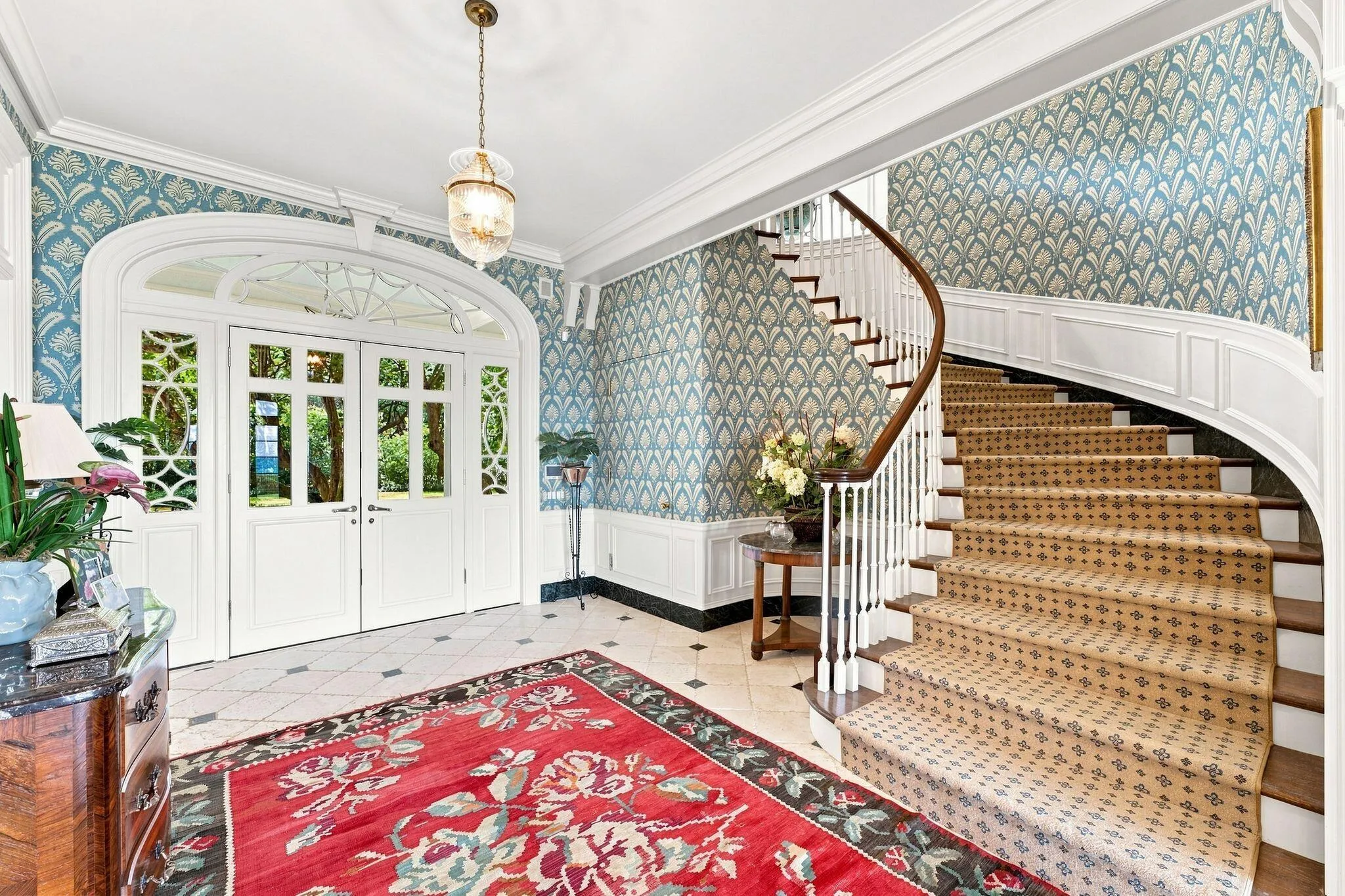 Entry hall with elevator at left