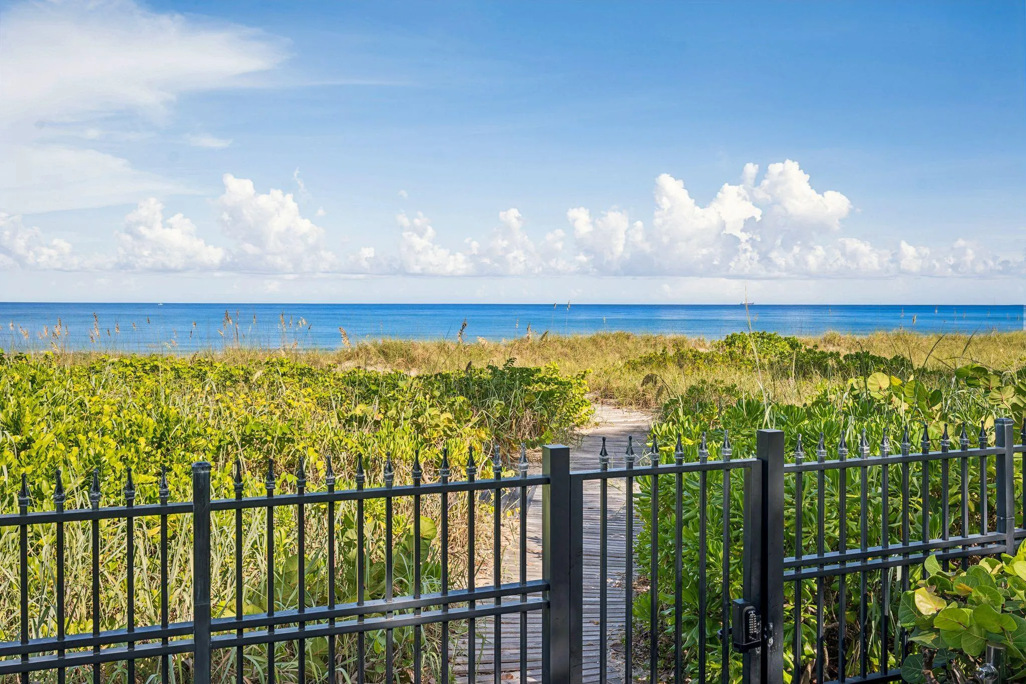 Private beach gate and boardwalk
