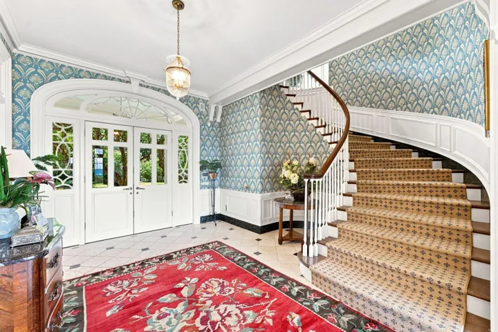Entry hall with elevator at left