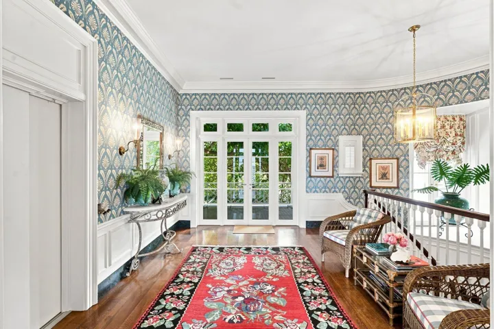 Upstairs hall with elevator at left