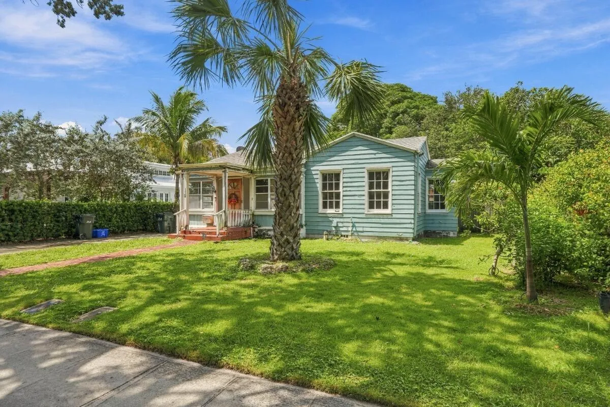 large yard with trees, right downtown
