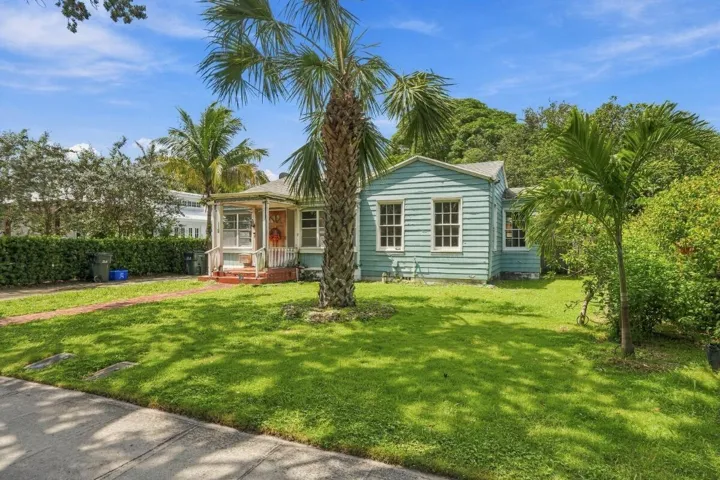 large yard with trees, right downtown