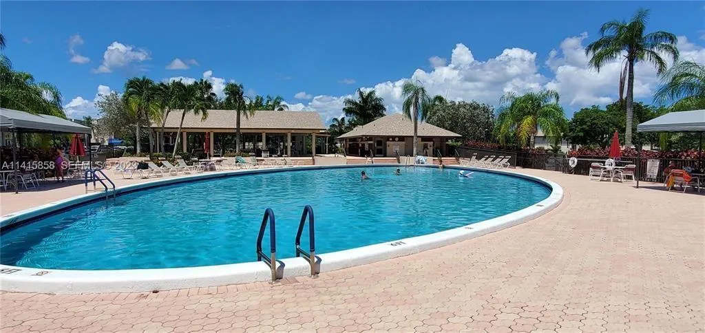 Huge and Beautiful Pool Area with Large Shaded Areas, Outdoor Covered Pavillion and Large Clean Bathroom Area