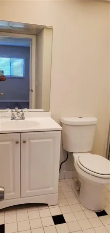 1 View of Master Bathroom with Newer Toilet and Vanity