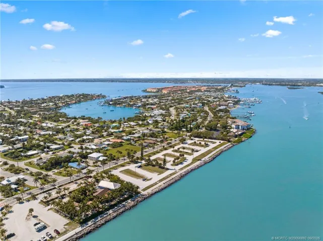 Aerial view highlights the waterfront setting and surrounding Fort Pierce and Hutchinson Island area.