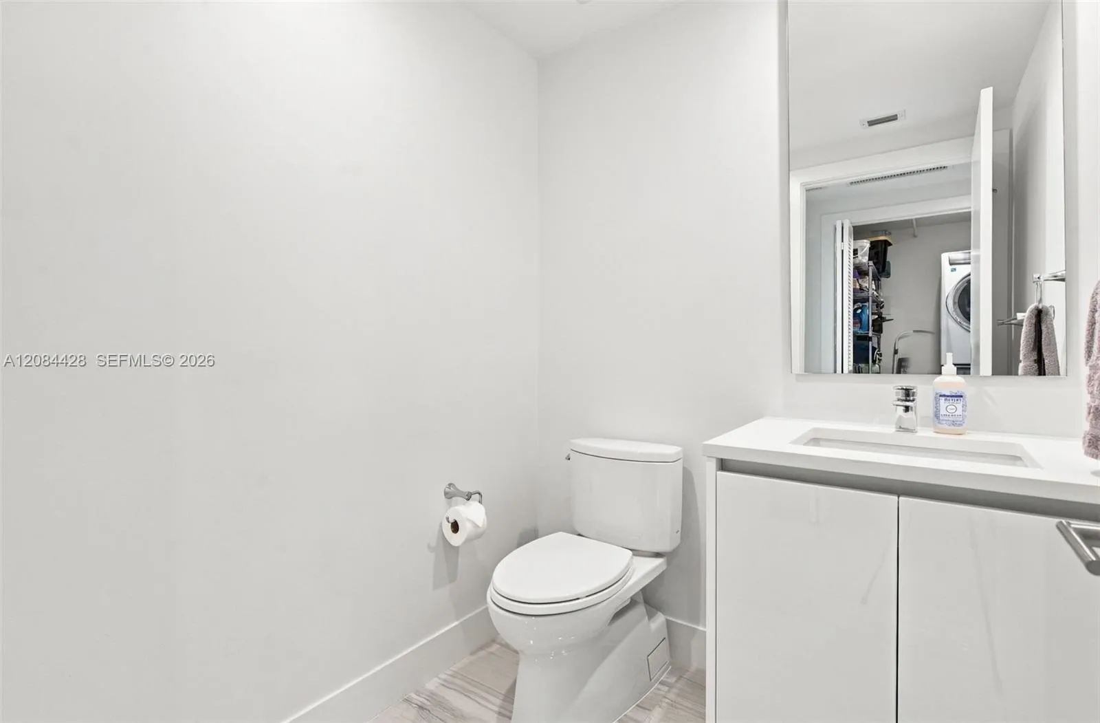 Convenient guest powder room.