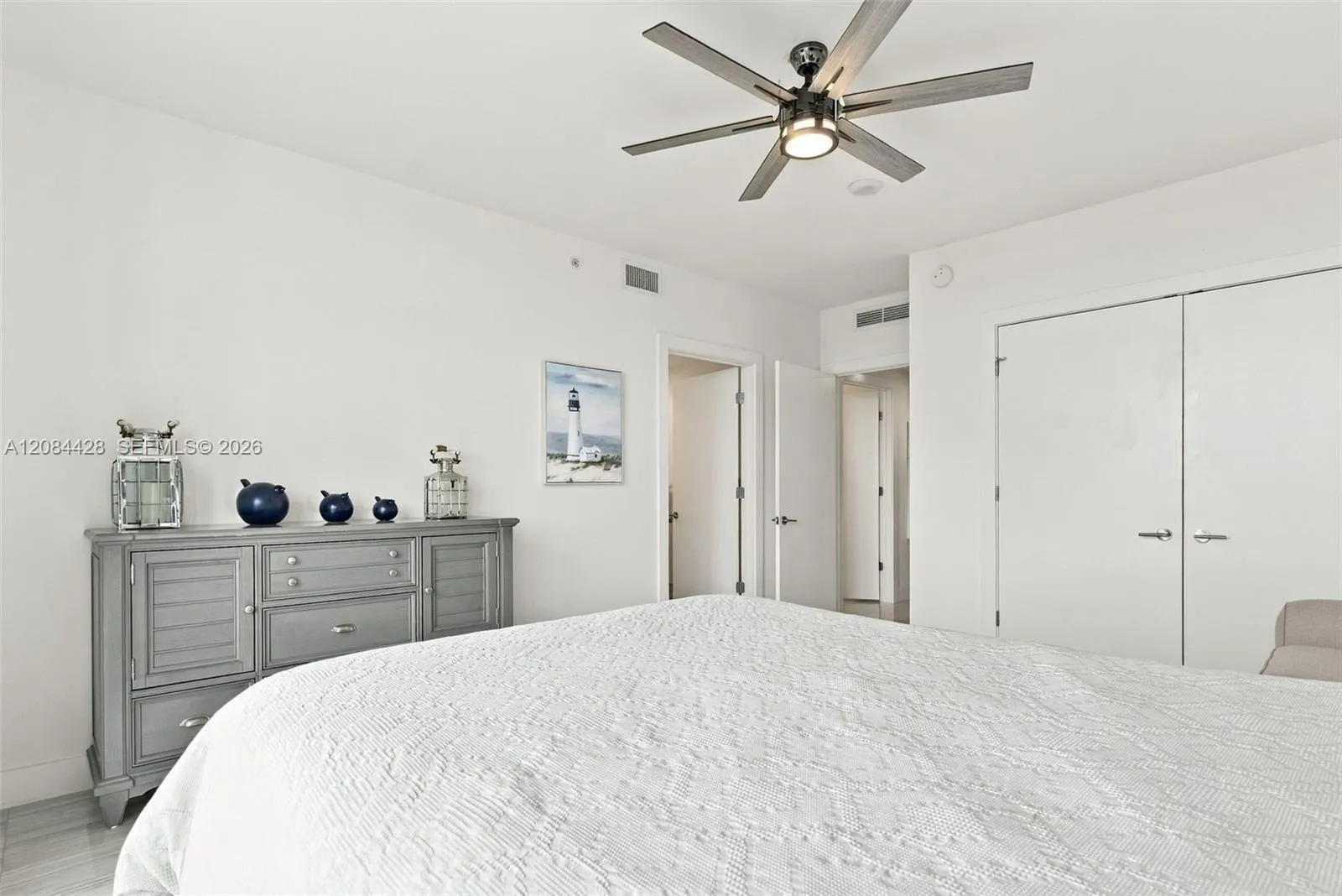 Additional view of the fully furnished guest bedroom. Guest bedroom includes a substantial custom-organized closet.