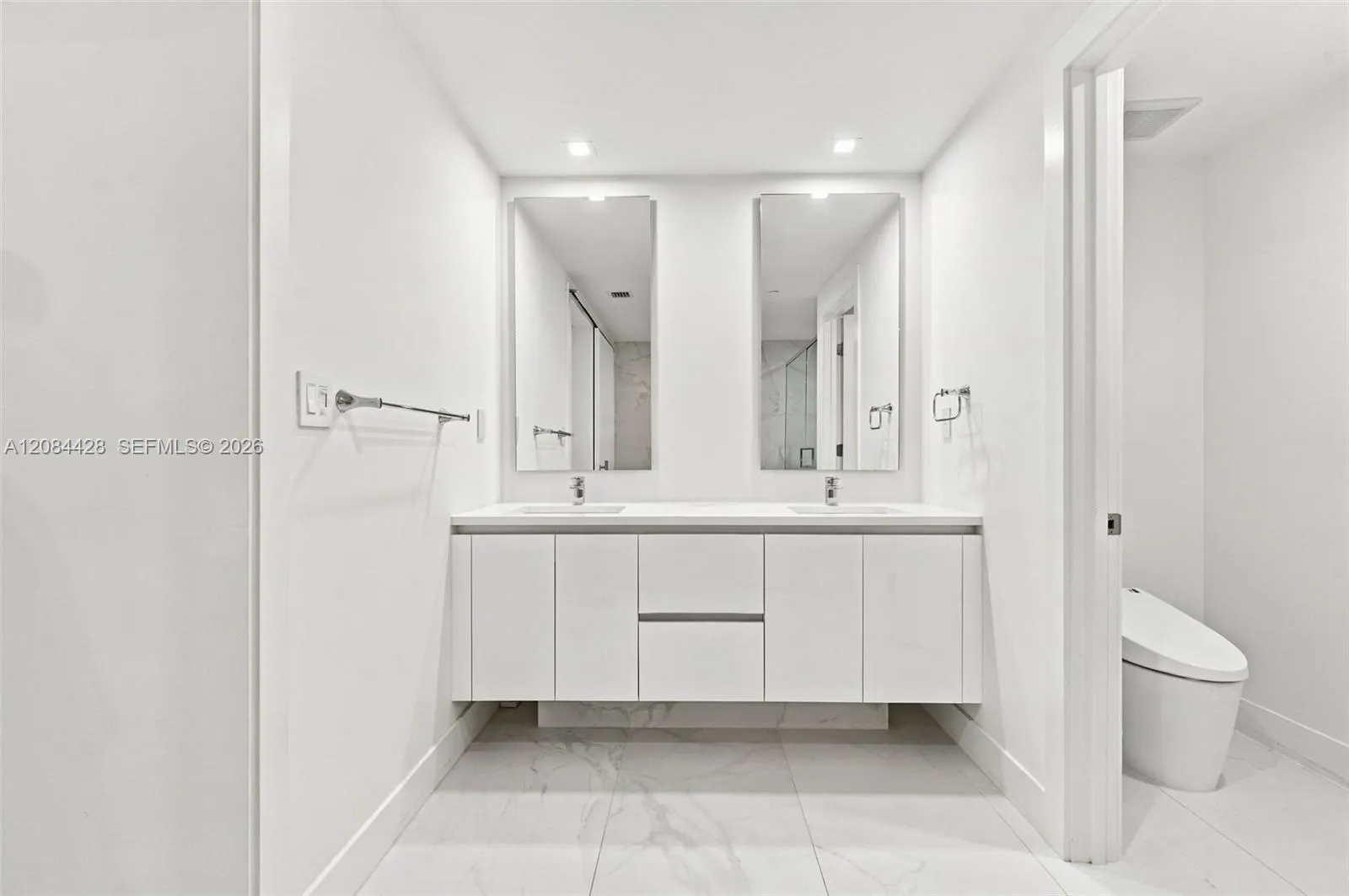 Dual sink vanity with generous storage.