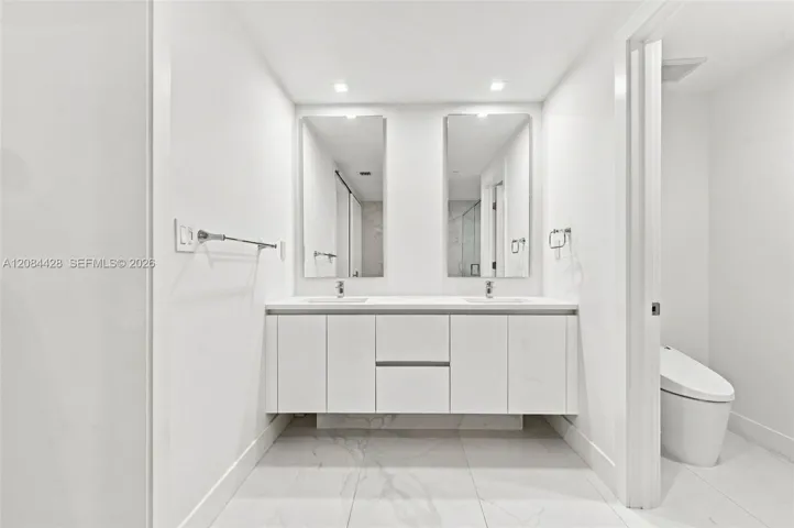 Dual sink vanity with generous storage.