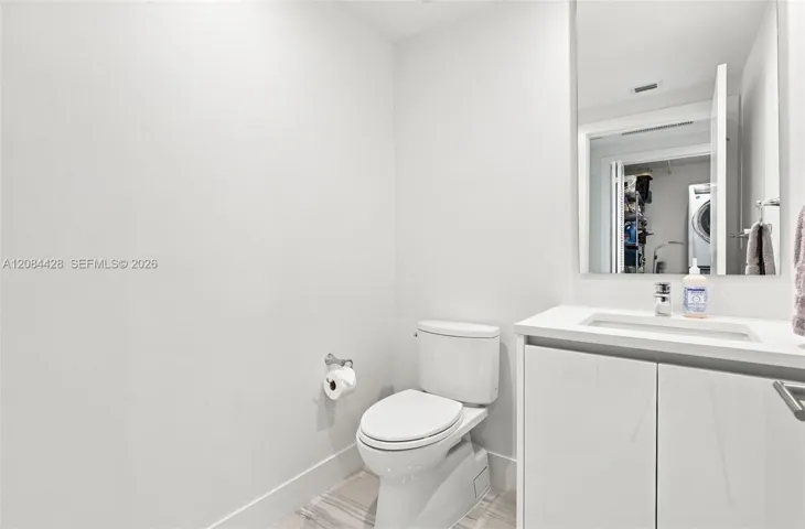 Convenient guest powder room.