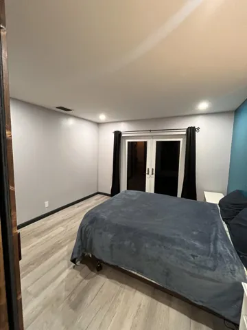 Primary Bedroom with/ensuite bath Double doors lead to backyard