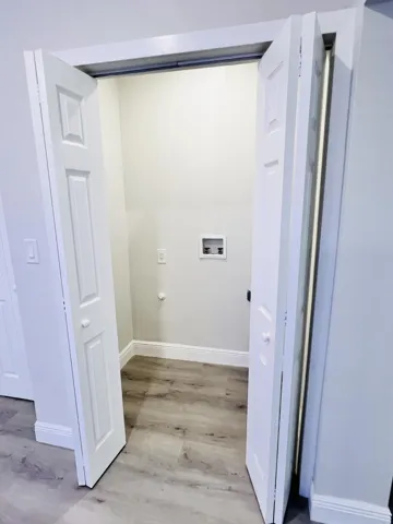 Washer and dryer hookups in laundry closet