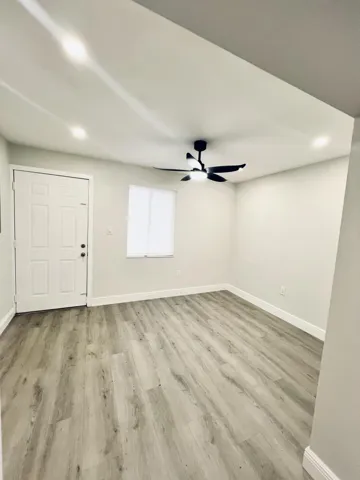 Florida/Dining Room with back door to back yard.