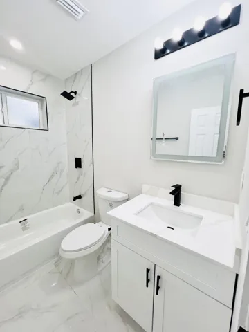 New bathroom with tub & shower combination