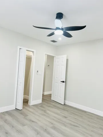 Bedroom 1 with closet lighting