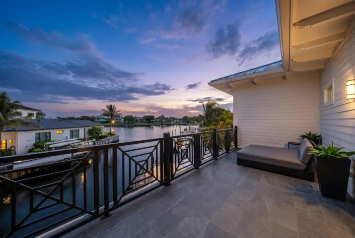 Large waterfront balcony with picturesque views.