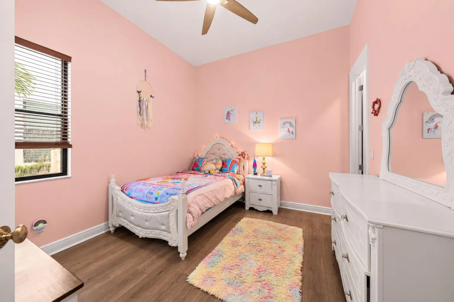 Bright room with 12ft ceilings and walk in closet.