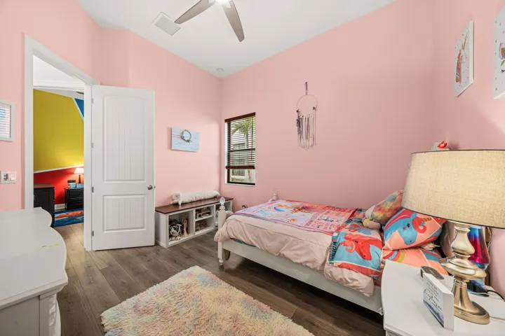 Bright room with 12ft ceilings and walk in closet.