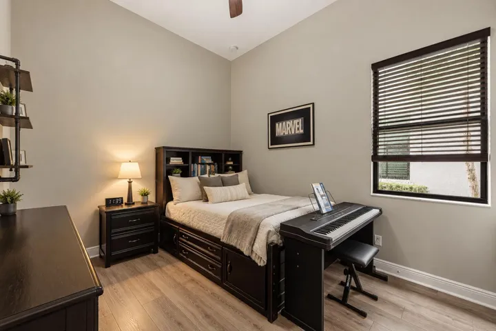 Bright room with 12ft ceilings and walk in closet.