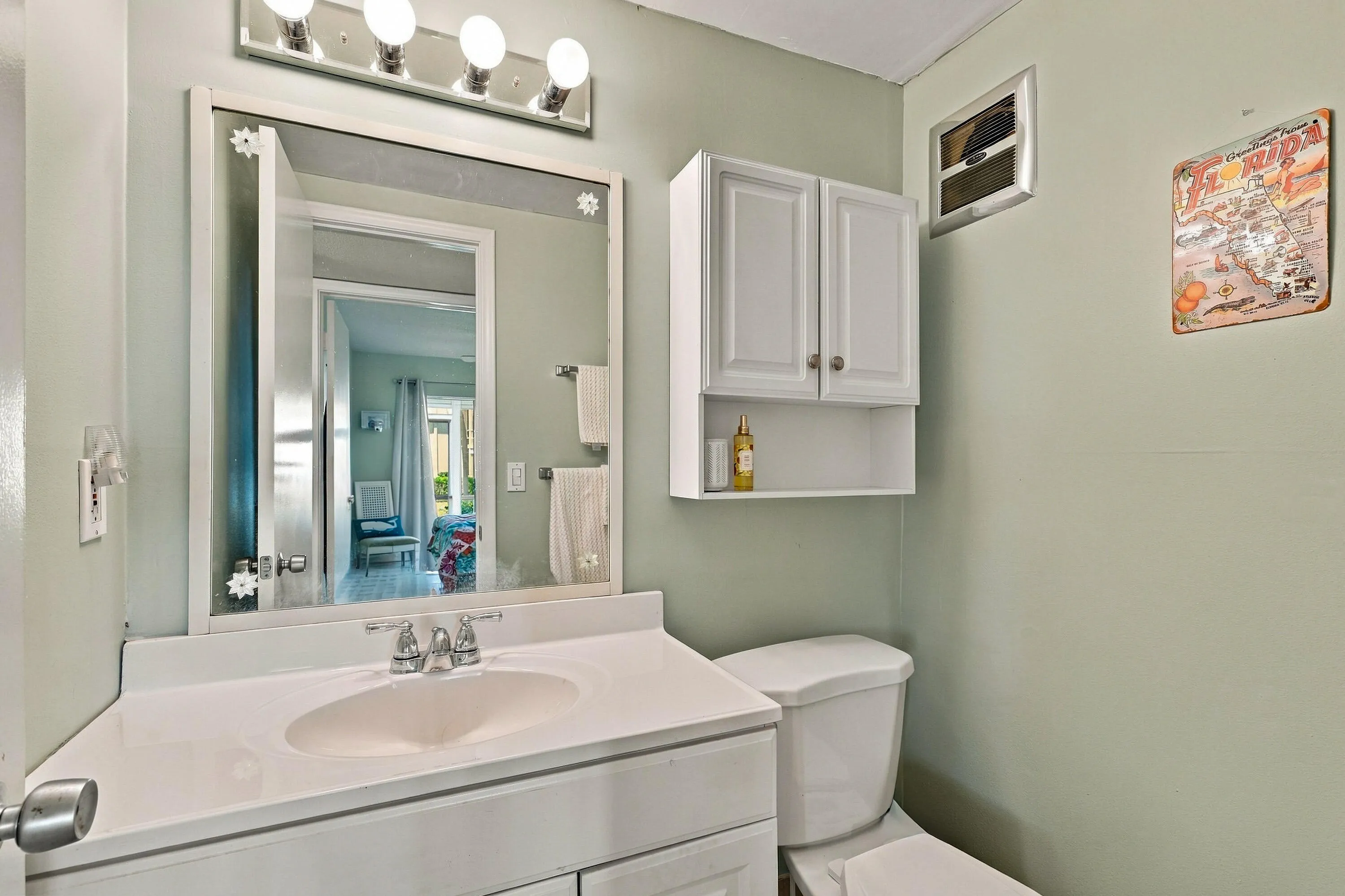 Half bathroom across from guest bedroom