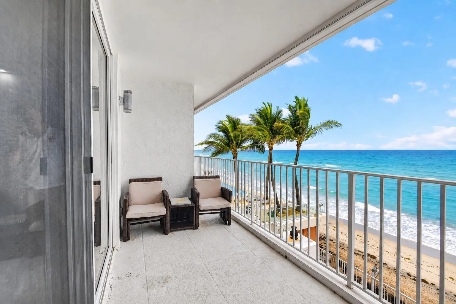 Balcony-Chairs-Palm Ocean View