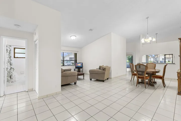 Large open layout and neutral colors. Den could be 3rd bedroom