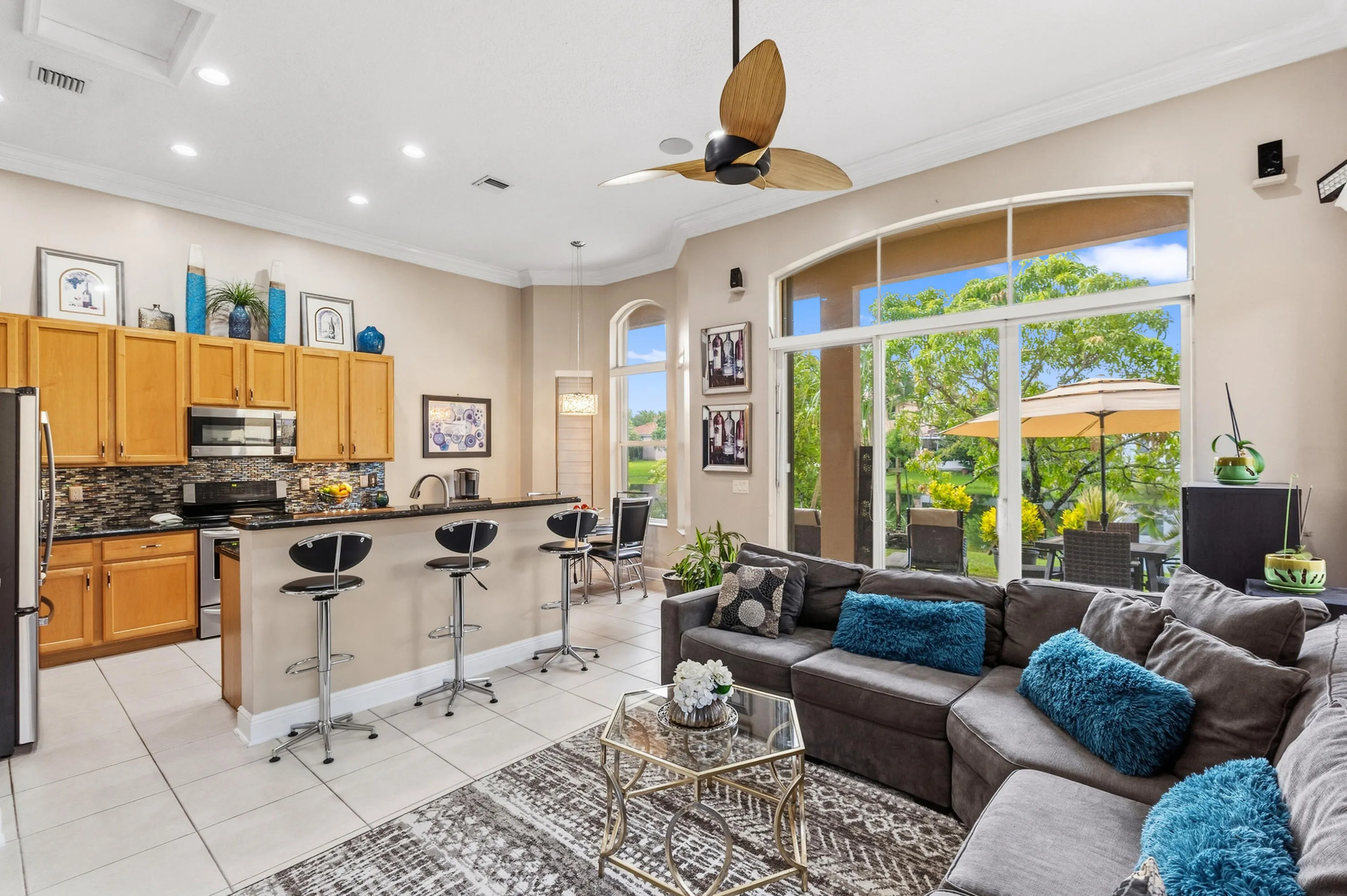 Open family room and kitchen create an inviting space for relaxing, gathering and entertaining.