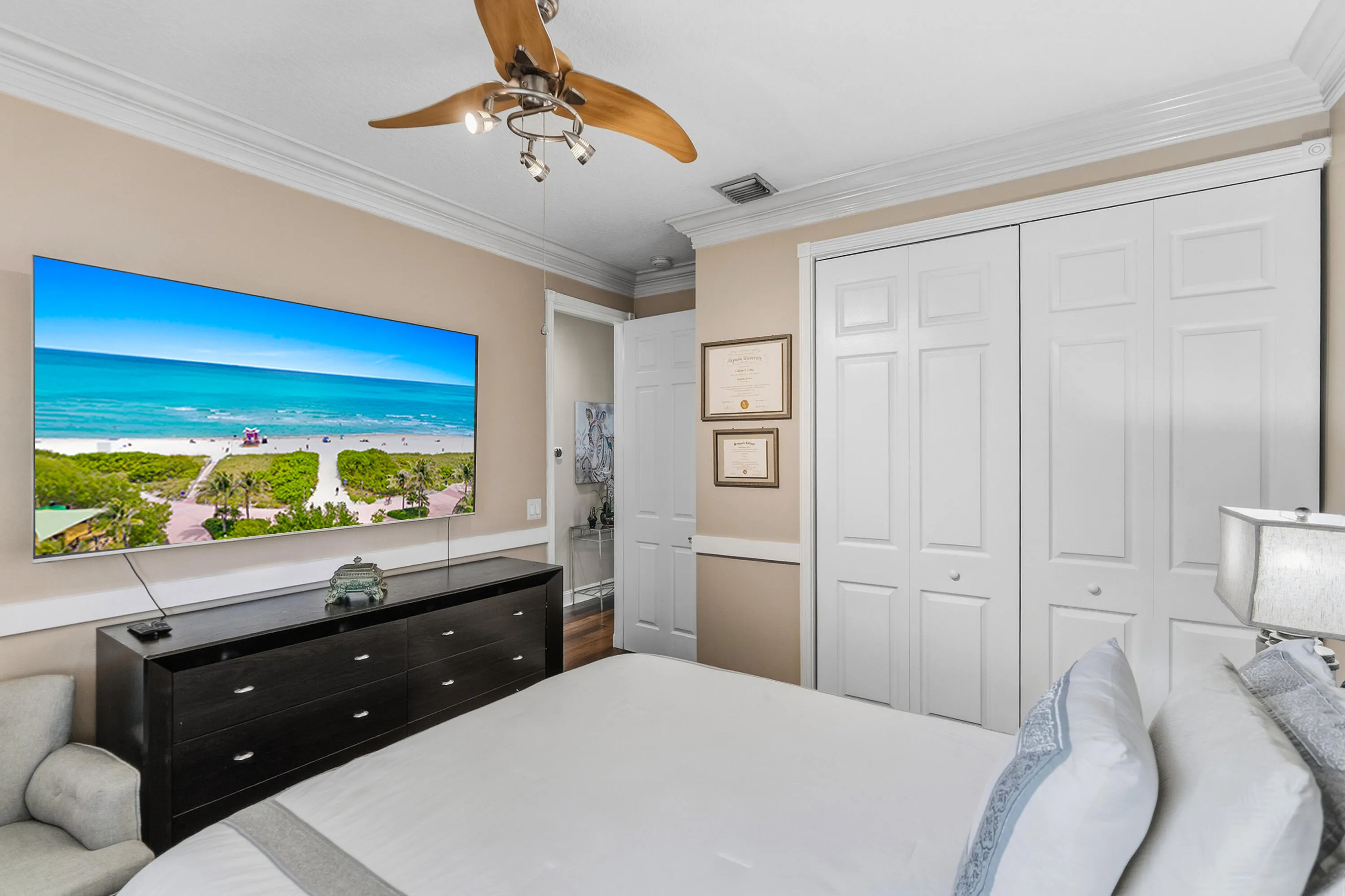 Alternate view highlights the bedroom’s generous proportions and ample closet storage.