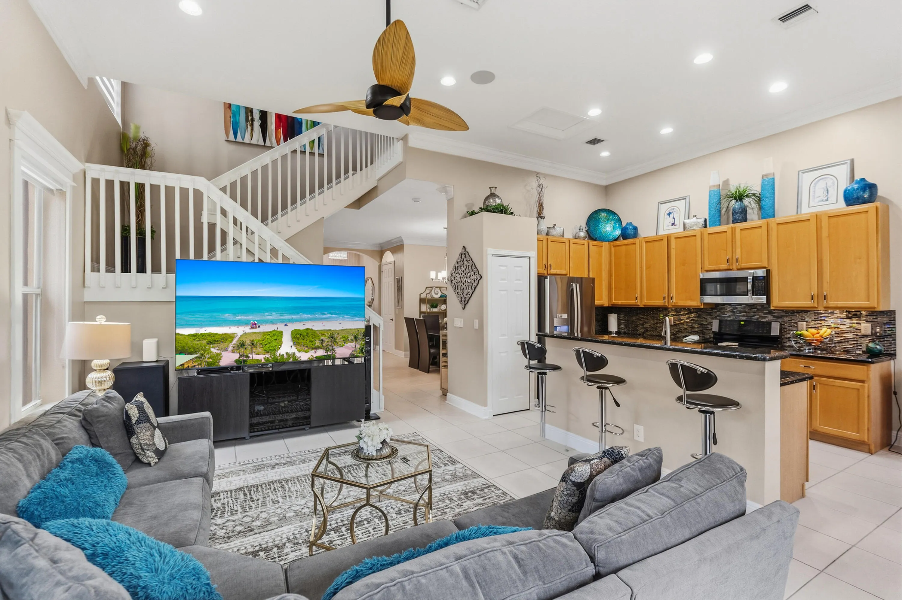 Open family room and kitchen create an inviting space for relaxing, gathering and entertaining.
