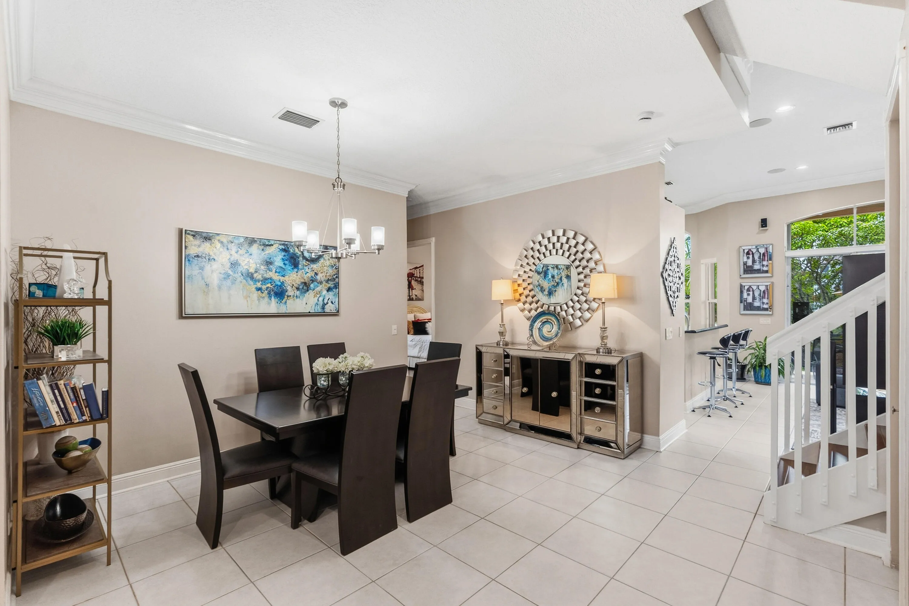Open connection between the dining and family room keeps the main level feeling spacious and inviting.
