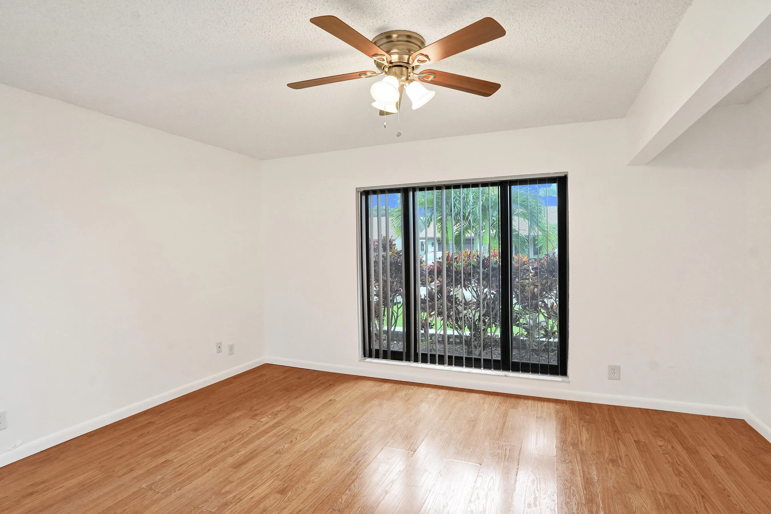 Wood-finish flooring with white walls