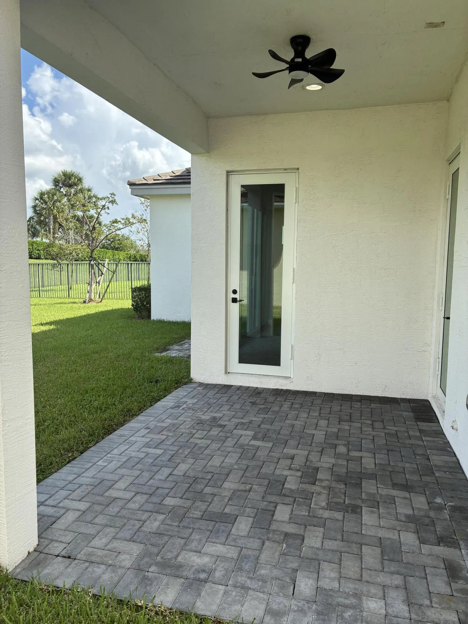 Back covered patio off the living room a