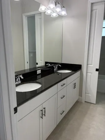 Upstairs bathroom double vanity and larg