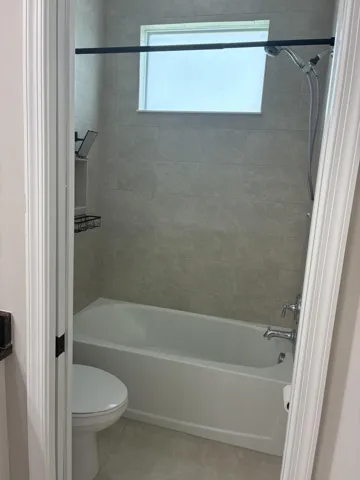 Upstairs bathroom with pocket door