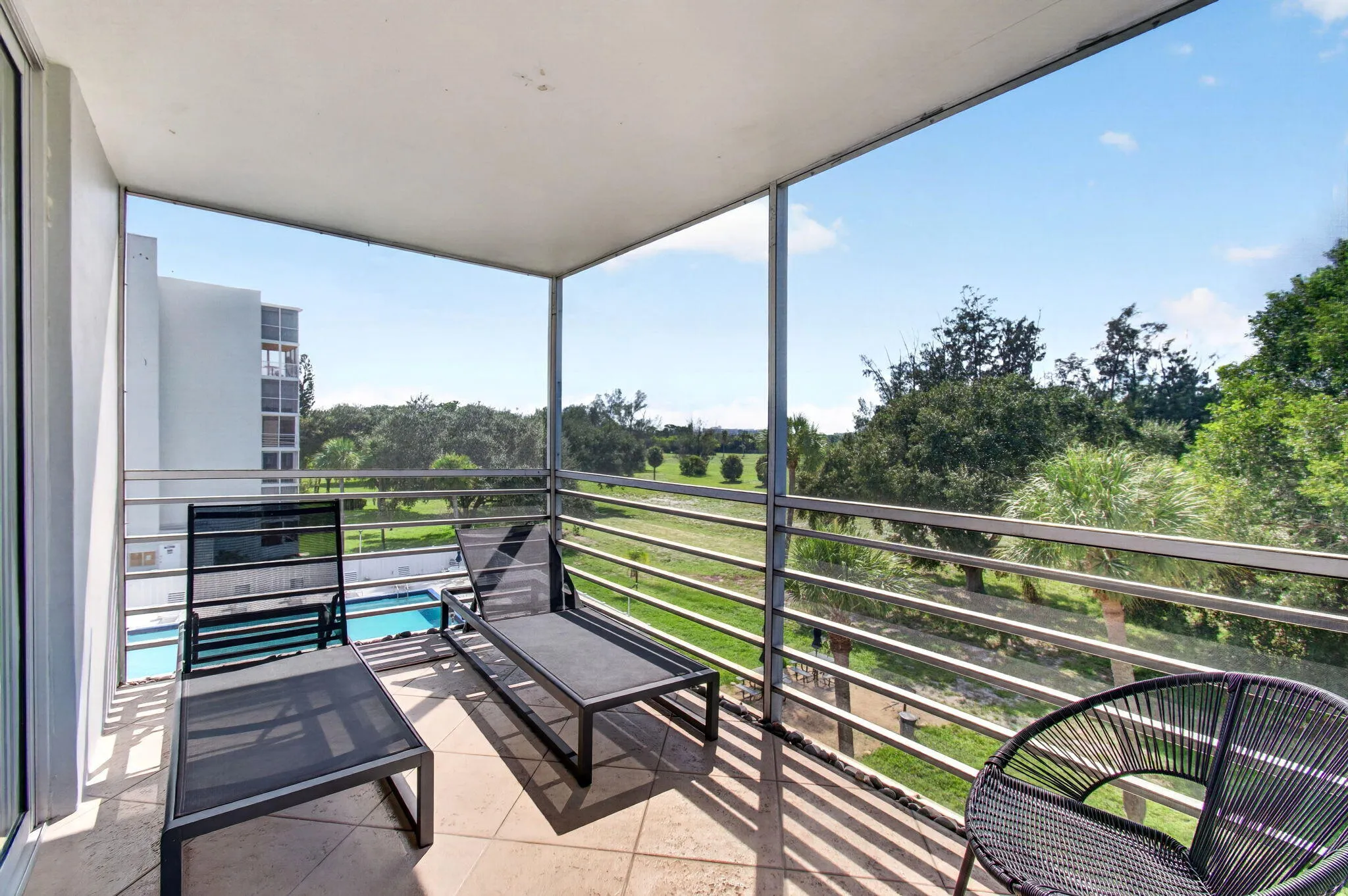 Screened In Porch Overlooking Pool