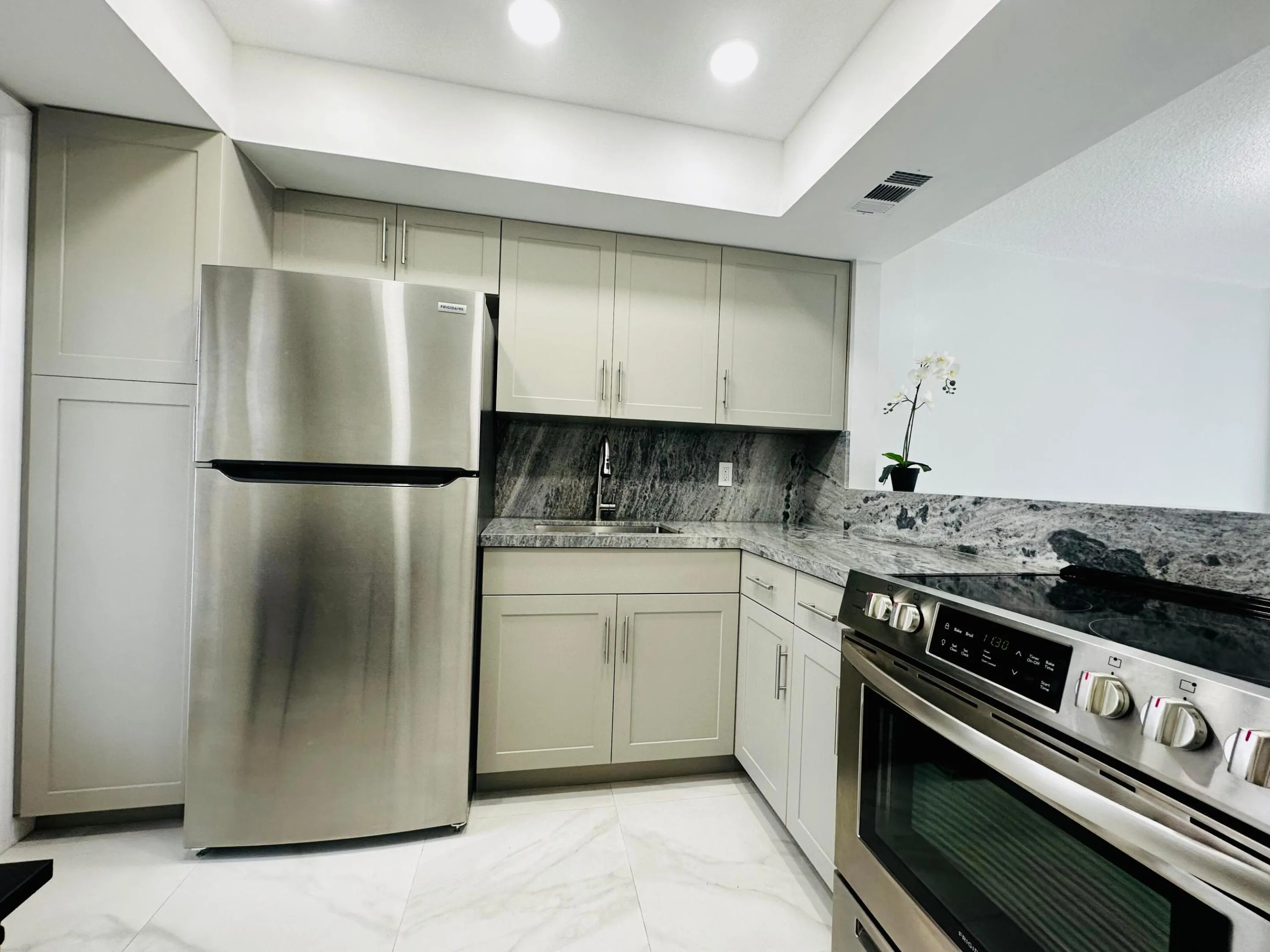 Kitchen when unit was vacant.