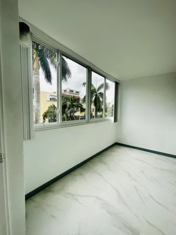 Enclosed balcony can be extra bedroom.