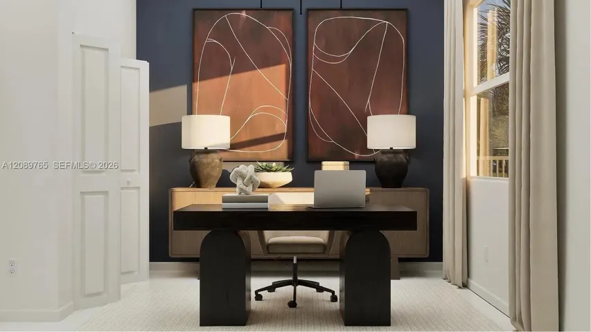 This first-floor bedroom offers a flexible space perfectly suited as a guest suite or home office.