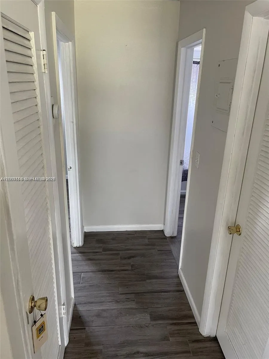 Hallway to bedroom and bathroom