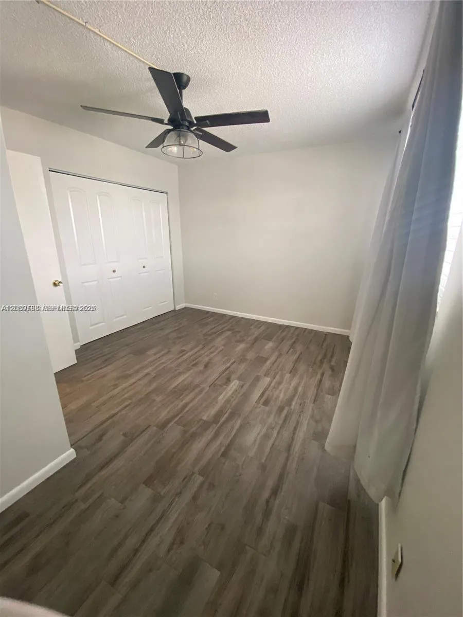 Large bedroom with study corner