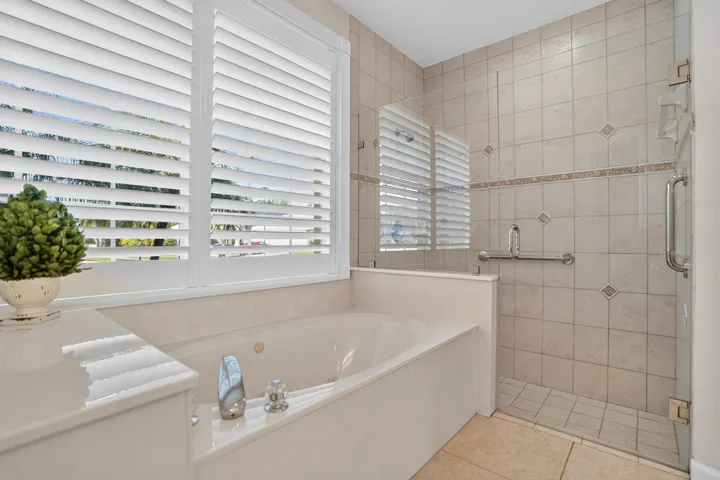 Built-in soaking tub with deck-mounted fixtures